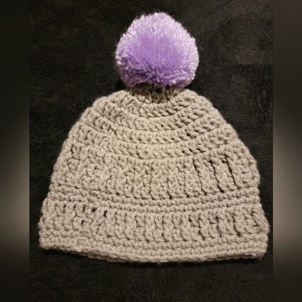 Handmade pom pom hat